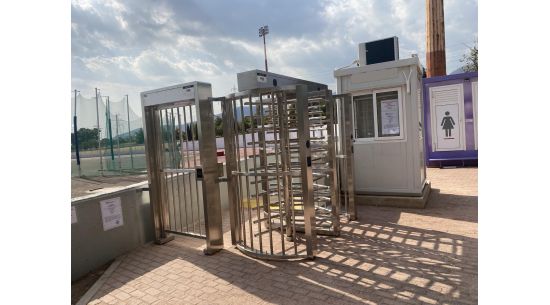 A turnstile access control system at the Olympic Village